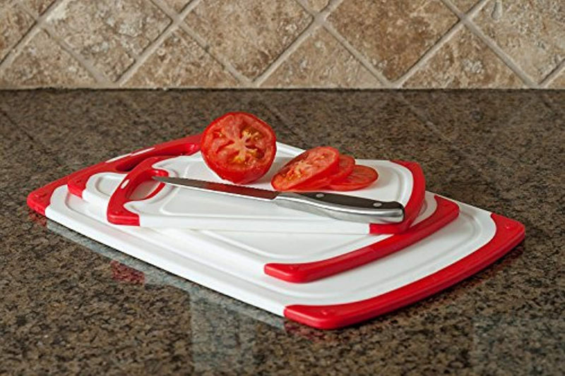 CC Boards 3-Piece Nonslip Cutting Board Set: Red and white plastic kitchen carving boards, each with juice groove and nonskid handle; dishwasher safe